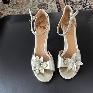 Gold leather dress sandals.